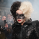 Cruella (Emma Stone) looks nine billion times better in this jacket than in any potential Dalmatian coat.